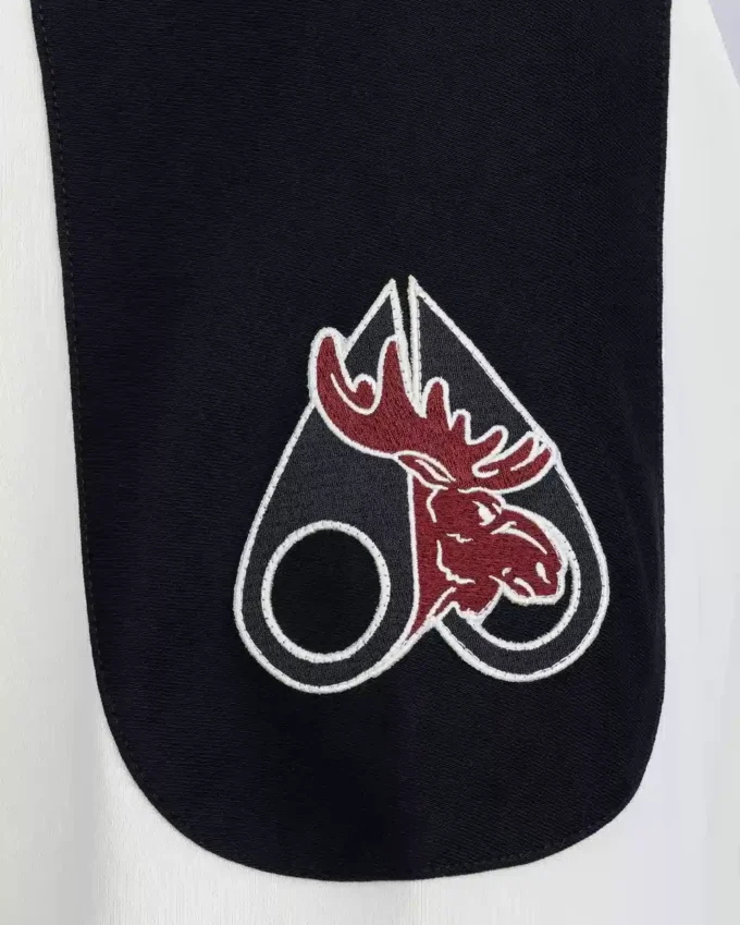 Polo del equipo NHL X Moose Knuckles Polo del equipo NHL X Moose Knuckles